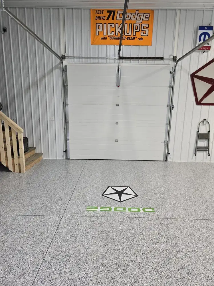 Grey flake custom floor with Dodge and Chrysler logos