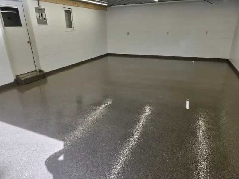 Glossy solid grey coating in an empty residential garage