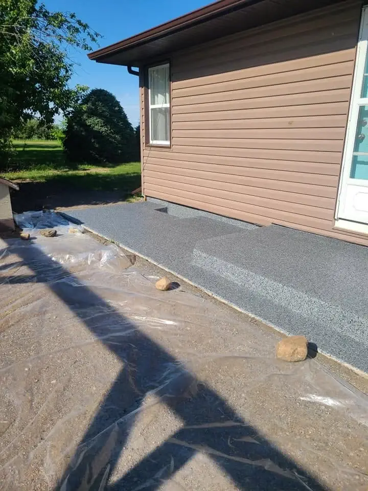 Grey textured coating on a narrow residential deck