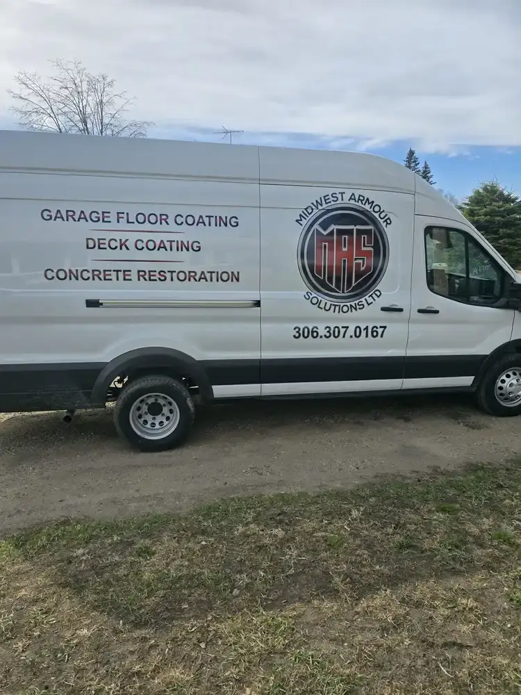 Side of the Midwest Armour Solutions work van with the company logo